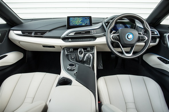 The i8 can cover up to 22 miles on battery power, enough for the average British daily commute