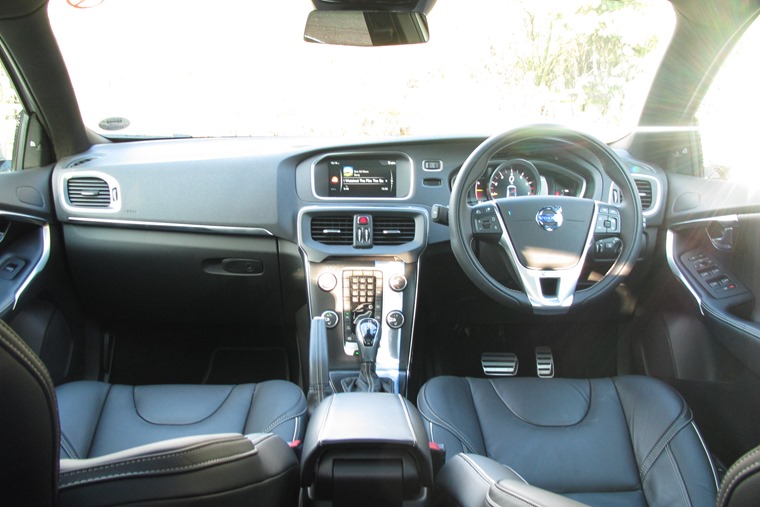 The interior is typically Volvo with classy black leather and sturdy plastics