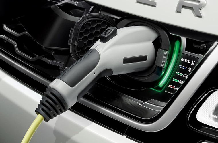 The government has scrapped its plug-in car grant for hybrids and reduced it for all-electric cars.
