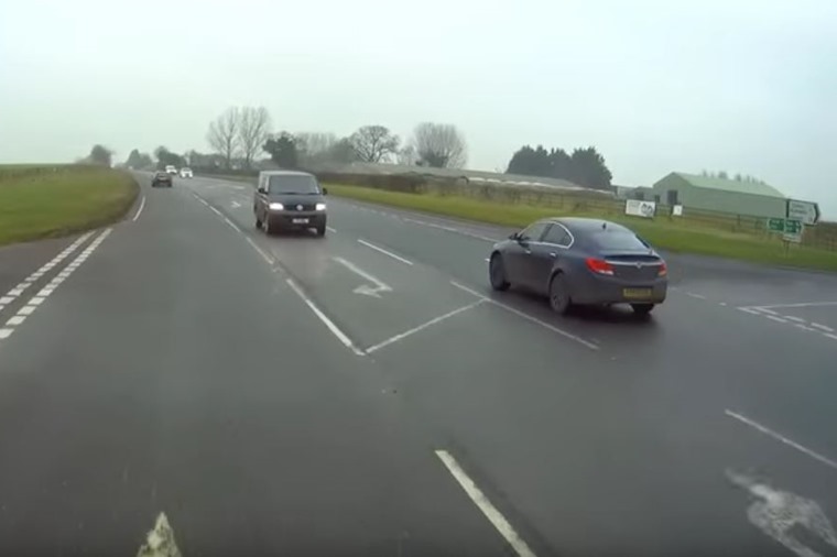 The risky (and highly illegal) overtake was caught on film from a lorry driver's cab.