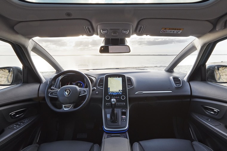 Interior features a 8.7in touchscreen infotainment system and a panoramic roof.