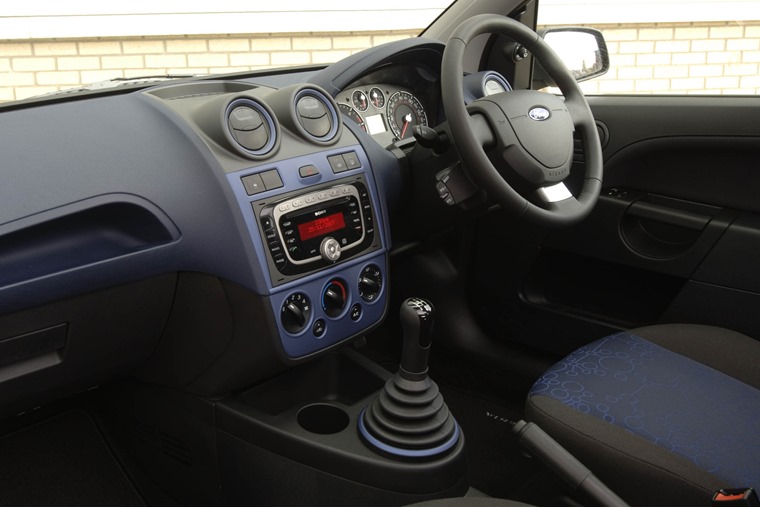 Supermini interiors have come a long way... note lots of buttons and a CD player. 