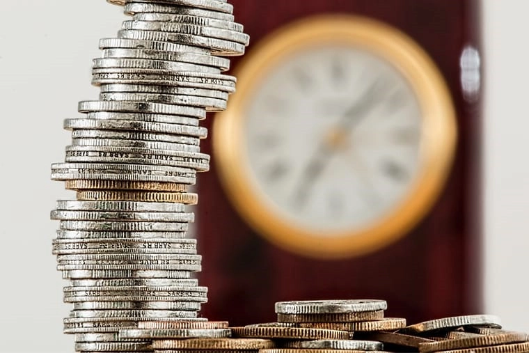 A stack of coins, showing money saved over a period of time.