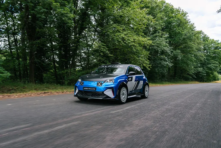 Alpine A290 Beta electric hot hatch driving on country road
