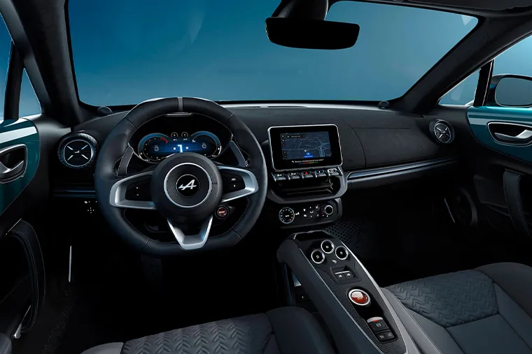 Alpine A110 interior with steering wheel, dashboard and infotainment screen