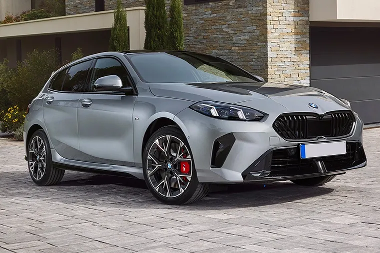 Front three-quarter view of a silver BMW 1 Series hatchback parked in front of a modern stone house, showcasing its sporty design and alloy wheels.
