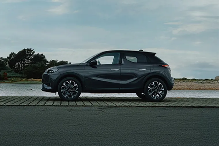 DS 3 compact SUV side profile parked by the water