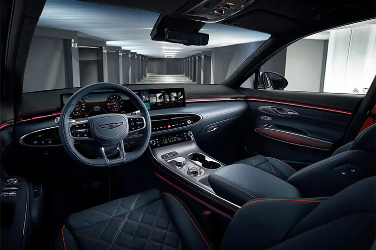 Genesis GV70 interior with steering wheel, digital display and luxury trim