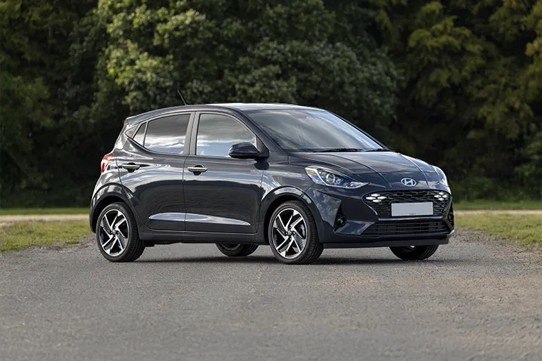 Compact Hyundai hatchback parked outdoors, ideal for budget car leasing under £200 per month