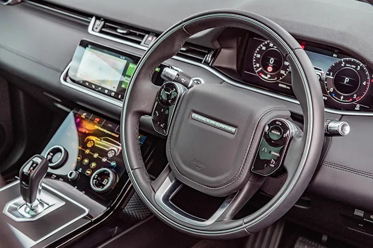 Range Rover interior with digital dashboard and touchscreen controls