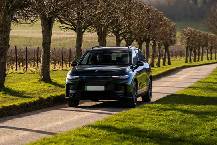 Leapmotor C11 electric SUV driving on a country road
