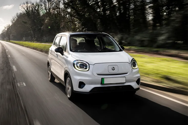 Leapmotor T03 compact electric hatchback front view driving on the road