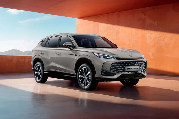 BYD Song SUV plug-in hybrid in beige parked in a modern architectural setting