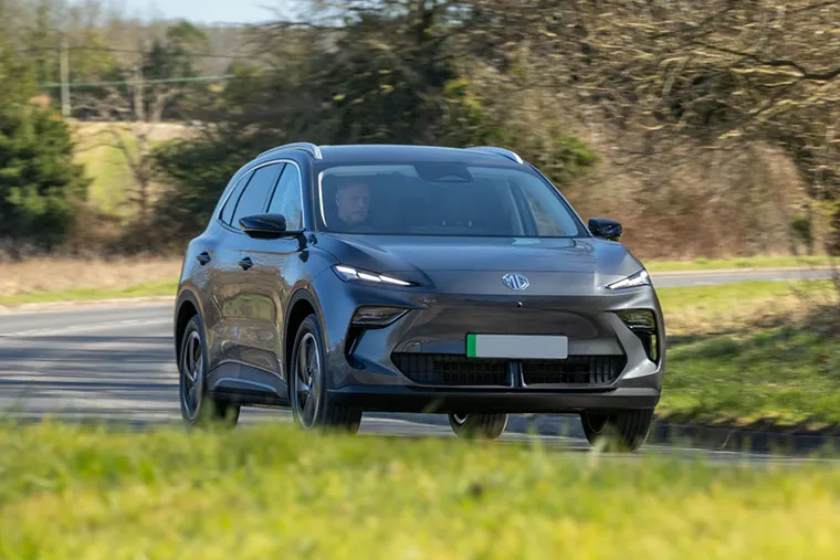 2025 MG Marvel R electric SUV in grey driving on a country road