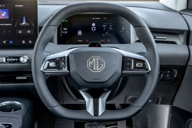 Close-up of MG4 EV steering wheel and digital dashboard interior