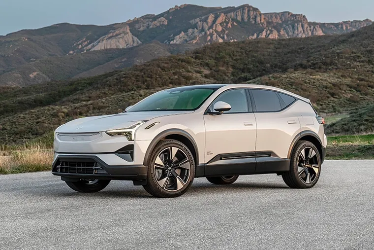 Polestar 3 electric SUV parked with mountain backdrop.